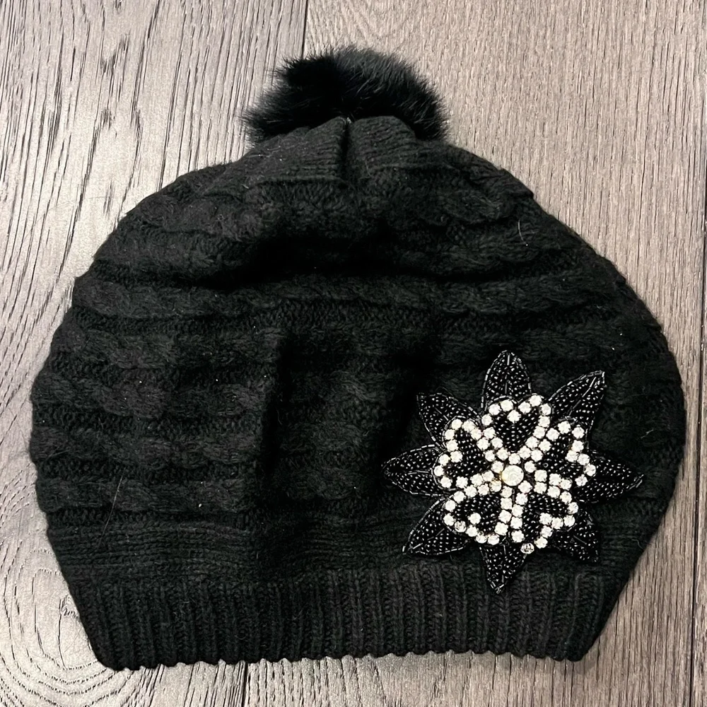 Black Pom Pom Knit Beret Hat with Rhinestone Snowflake Detail